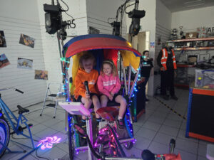 The rickshaw out on site after dark.